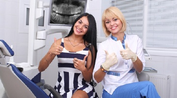 woman happy at dentist