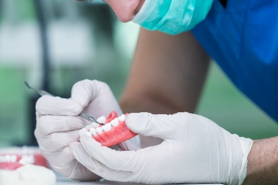 Technician making dentures