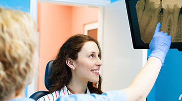 woman pointing to x-ray