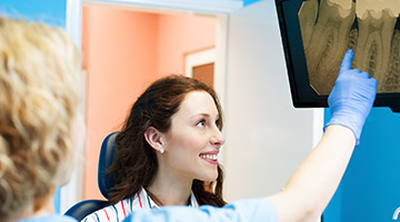 woman pointing to x-ray