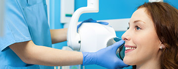 Woman receiving dental x-rays