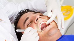 Man receiving dental exam