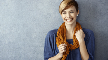 woman in scarf smiling
