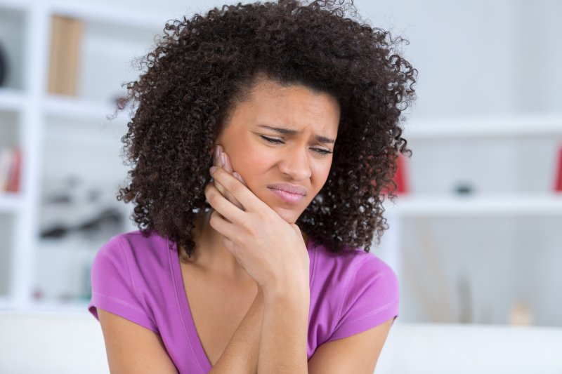 Woman with jaw pain